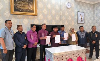 Amin Hadiri Penandatanganan Berita Acara Serah Terima Pinjam Pakai Gedung